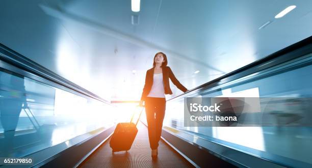 Businesswoman At Airport Stock Photo - Download Image Now - Adult, Adults Only, Airport