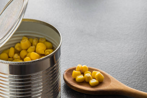 istock Canned corn in the can on the table. Healthy eating. 652182978