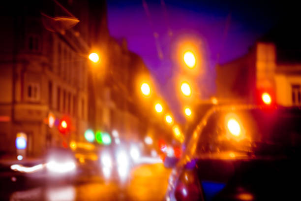 夜の街の通りの光の道 - lighting equipment defocused street light city ストックフォトと画像