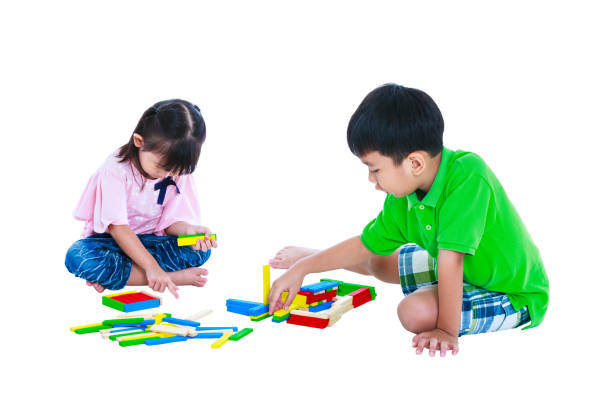istock Children playing toy wood blocks, isolated on white background. 652184244