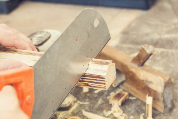 istock Carpenter working on the raw board / wood. 652184880
