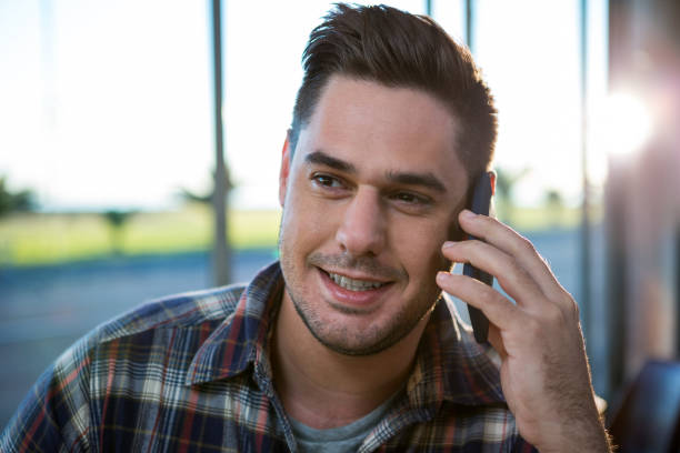 istock Handsome man talking on the phone 652187442