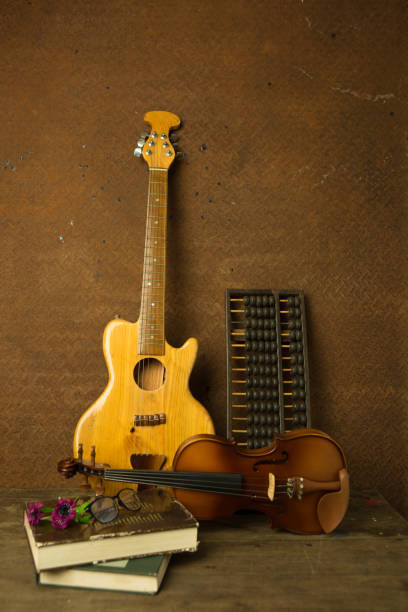 istock Vintage violin with old steel background with flower 652187746
