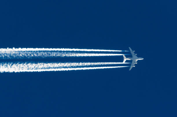 istock Airplane big four engines aviation airport contrail clouds 652187826