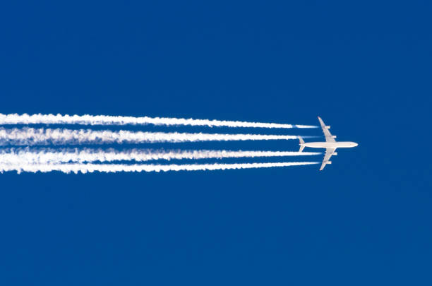 istock Airplane big four engines aviation airport contrail clouds 652187874