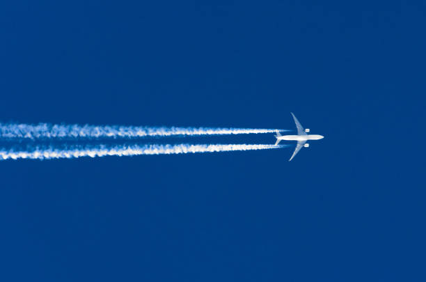 istock Airplane big two engines aviation airport contrail clouds 652187908