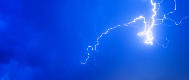 istock Thunderstorms thunder lightning night sky clouds overcast summer rain, background panorama and with space for text 652188000
