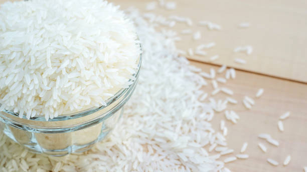 istock jasmine rice in a bowl on a wooden background. 652191348