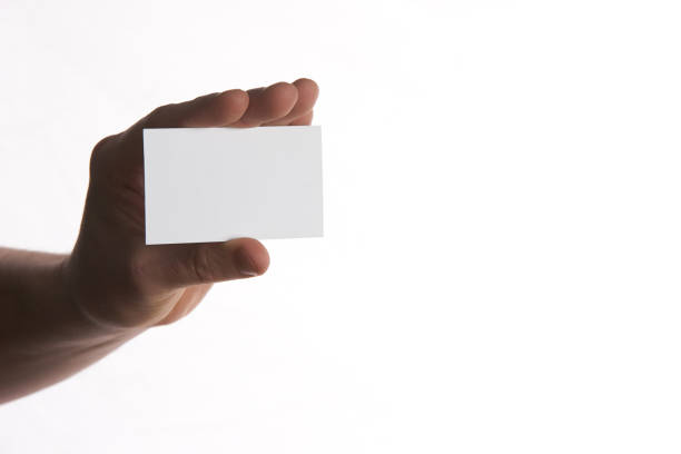 istock Businessman holding business card with copy space 652192358