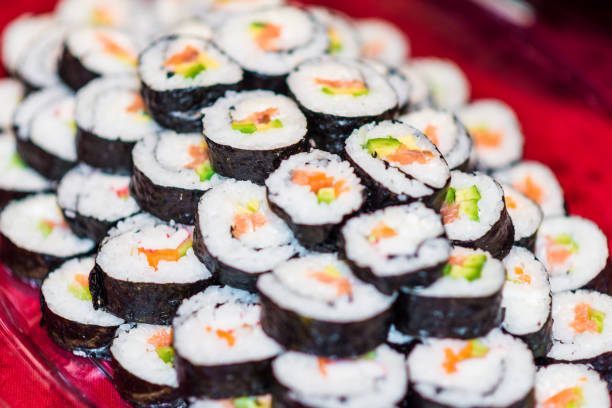istock Close up of a plate full with sushi rolls. 652199200
