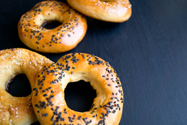 istock bagels with sesame seeds on a black background 652202908