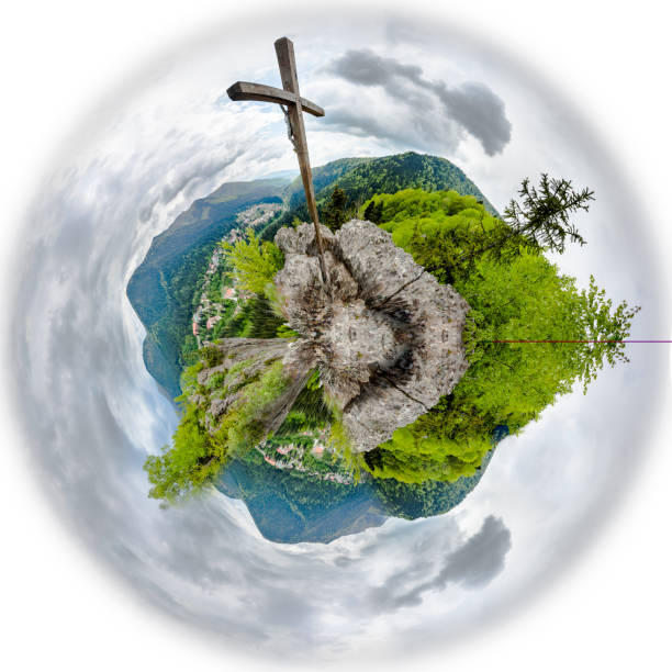 istock Wooden cross on mountain peak. Tiny planet 652203224