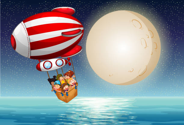 istock Children riding in the hot air balloon at night 652206564