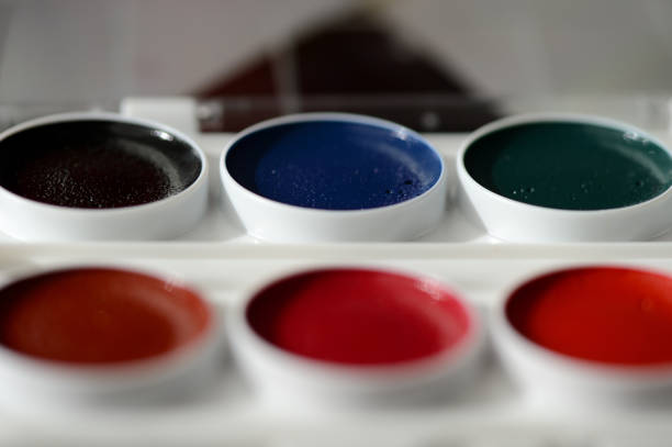 istock Box with watercolors and white paper close up 652211220