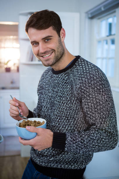 istock Portrait of man having cereal for breakfast 652216976