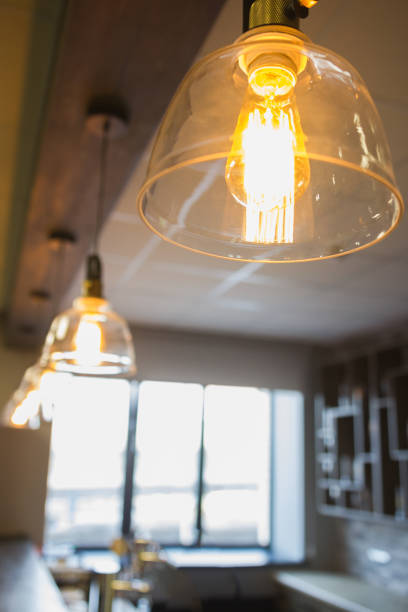istock Incandescent lamps in a modern cafe - cozy interior 652220524