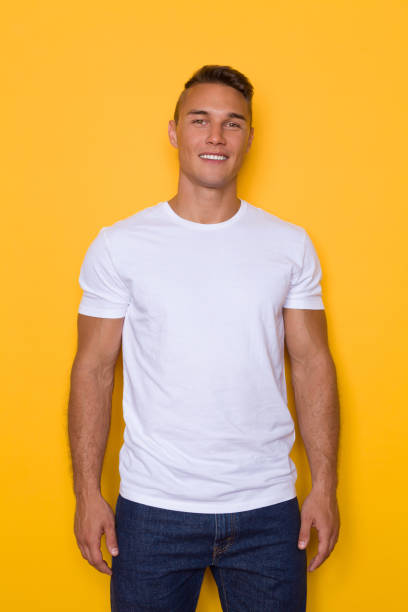 istock Young Handsome Smiling Man In White T-shirt 652220932