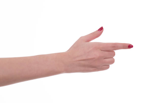 Close-up of a woman’s hand touching the illuminated display, connected to the future
