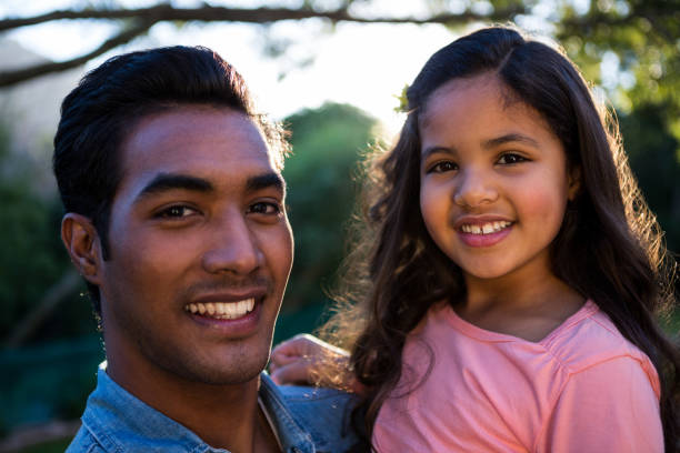 istock Father carrying daughter in his arms 652225758