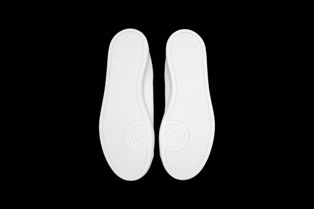 istock Sole White Sneakers isolated on Black Background 652226450