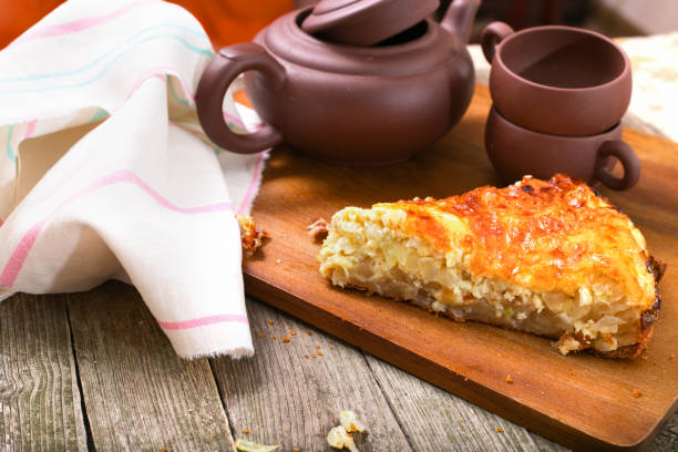 istock Badly being pro-concerned pie against the background of ceramic ware 652240792