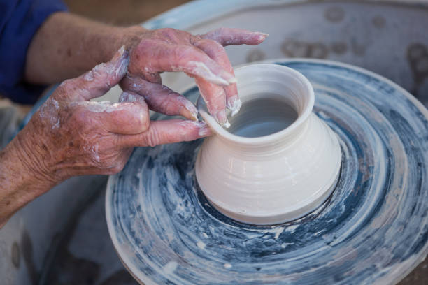 istock Close-up of potter making pot 652241738