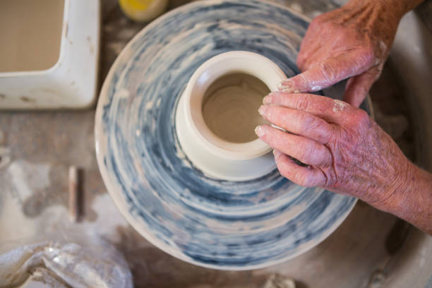 istock Close-up of potter making pot 652241884