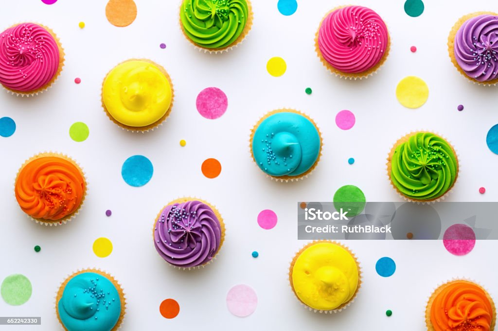 Cupcake background Colorful cupcakes on a white background Cupcake Stock Photo