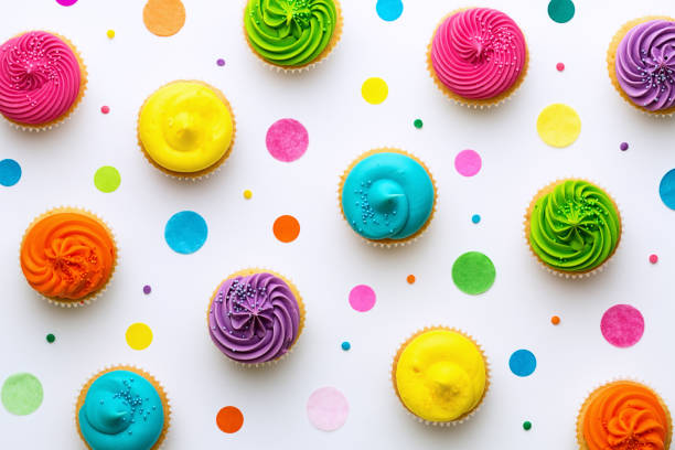 Cupcake background Colorful cupcakes on a white background concepts topics stock pictures, royalty-free photos & images