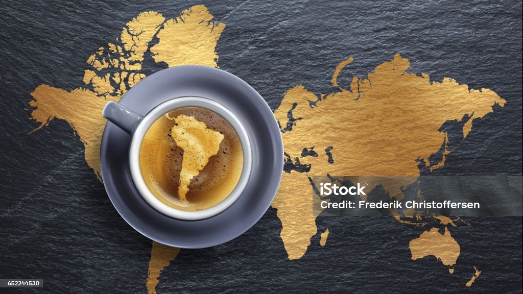 Coffee World Map An illustrated world map with a coffee cup on top of south America. The coffee in the coffee cup illustrates south America. Coffee - Drink Stock Photo