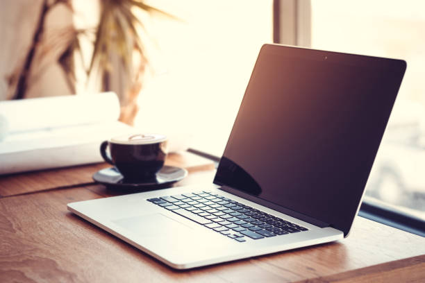 istock Office workplace with laptop on wood table against the windows. 652245052