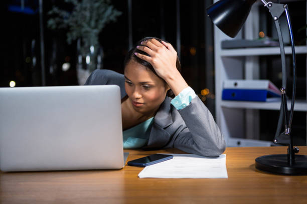 istock Tired businesswoman sleeping on the desk 652262928