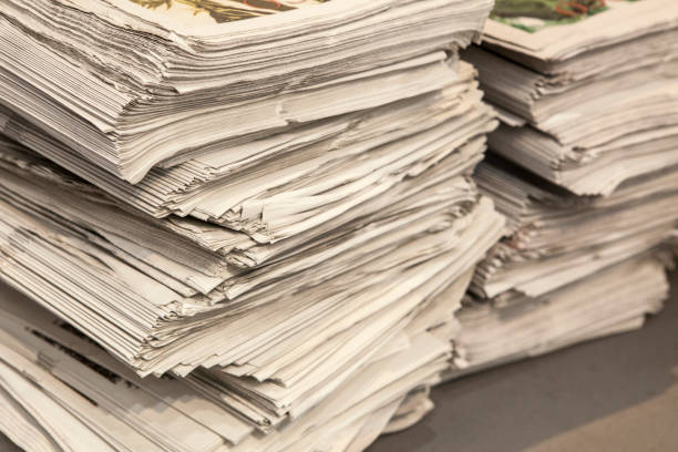 istock Two huge pile of many newspapers 652271074