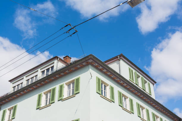 istock European Town House Shutters Windows Corner Perspective Architectural Shot Blue Sky Clouds 652274344