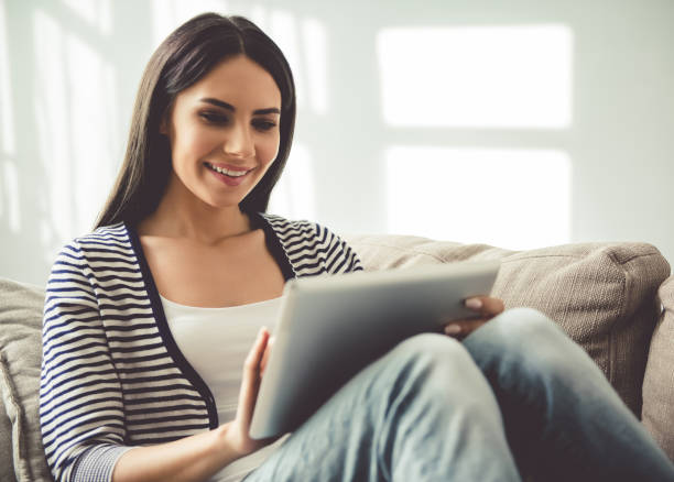 istock Beautiful woman with gadget 652276994