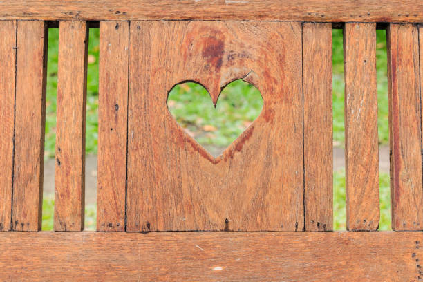 istock Heart shape in wood background 652278626