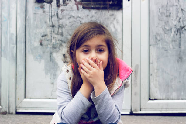 Little girl having fun. Summer night. Happy child. Motion photo. Natural Beauty