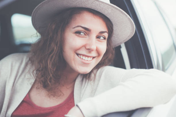 istock Curly woman travelling in the car 652291180