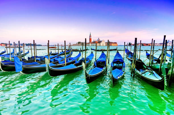 istock Gondolas moored on the canal in Venice 652291186