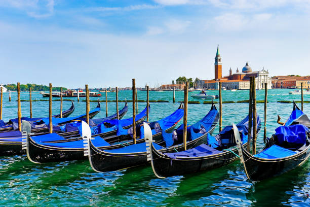 istock Gondolas moored on the canal in Venice 652299720