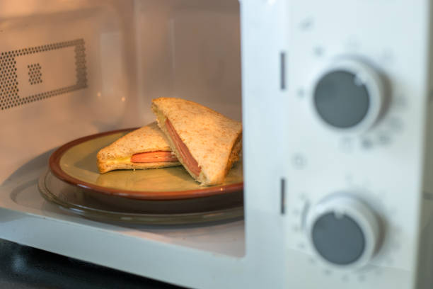 istock Ham cheese sandwiches in the microwave 652302608