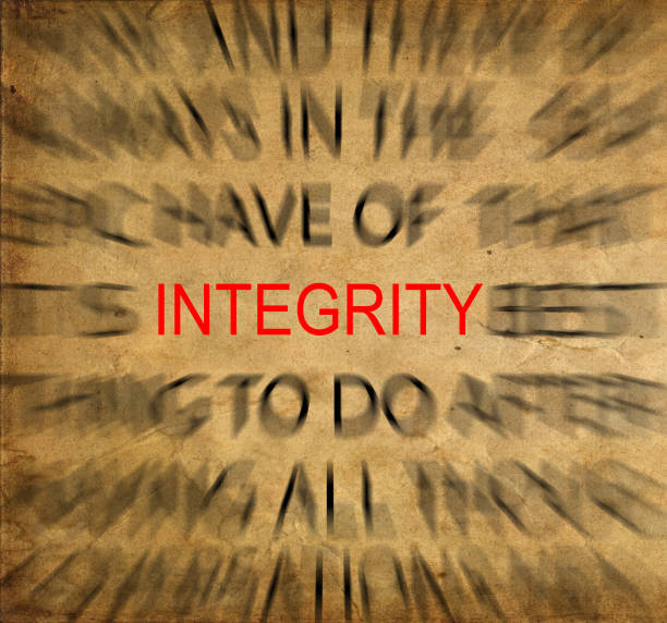 istock Blured text on vintage paper with focus on INTEGRITY 652309552