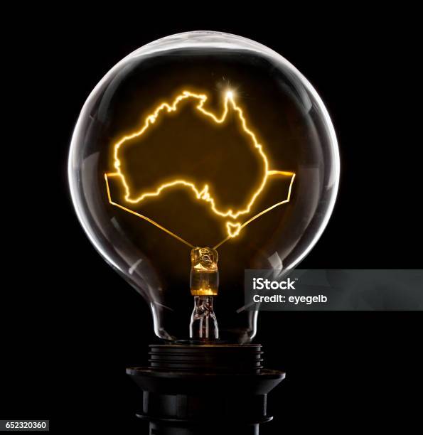 Lightbulb With A Glowing Wire In The Shape Of Australia Stock Photo - Download Image Now