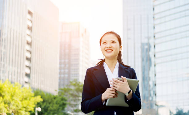 istock Asian businesswoman using digital tablet 652320446