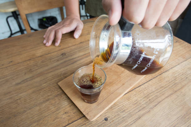 istock pour black coffee in a glass 652327420