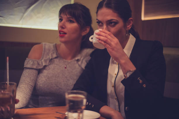 istock Two best friends gossiping at the bar 652338062
