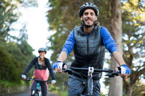 istock Biker couple cycling in countryside 652342476