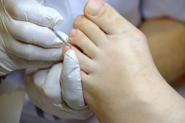istock Pedicure specialist works with the patient 652342602