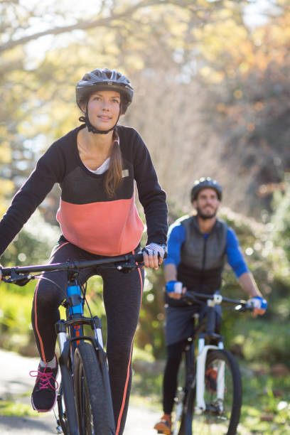 istock Biker couple cycling in countryside 652342622