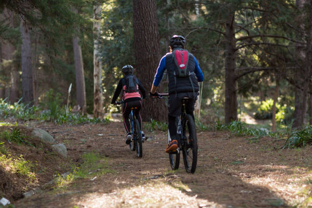 istock Biker couple cycling in countryside 652343044